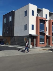 The townhouse has the same modern look that all of Geos has. My 25-year-old son thinks it looks great, so I figure we are very up-to-date. That’s a new plum tree on the alley. You can’t see all the solar panels on the roof.